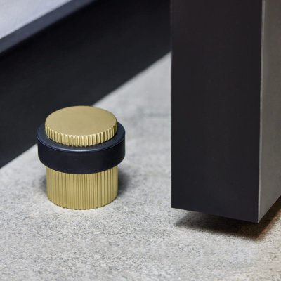 Sidfot Helix Stripe Gyllene golvdörrstoppare