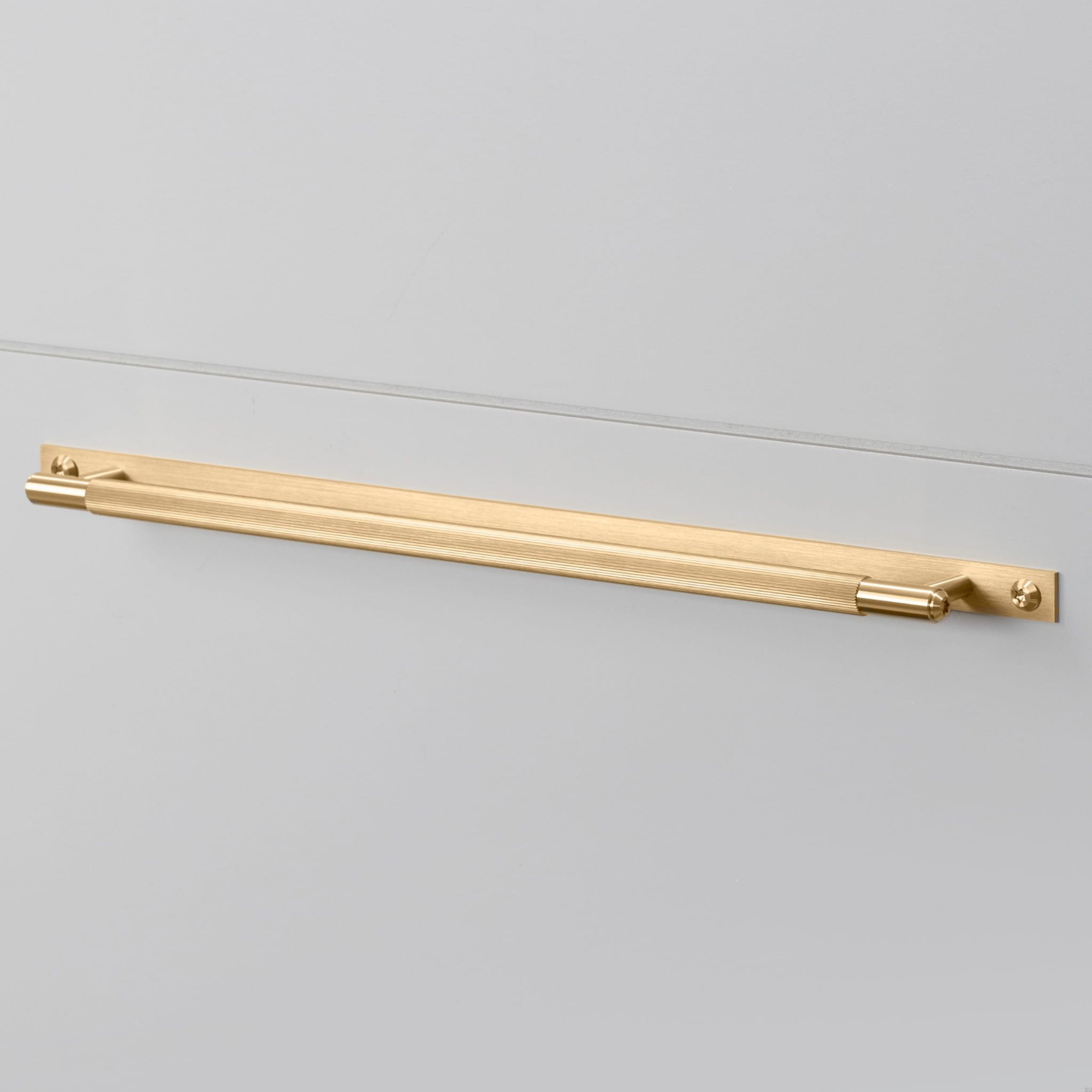 1.BusterPunch_Pull_Bar_Plate_Large_Linear_Brass-scaled (1).jpg