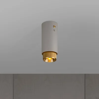 Avgaslinjär stålgrå taklampa med mässingsspot